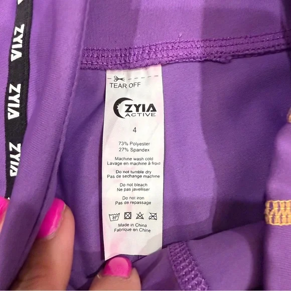 ZYIA Active Purple Game Day Performance 7/8 Leggings Yellow Cuffs size 4 NWT - Picture 4 of 10